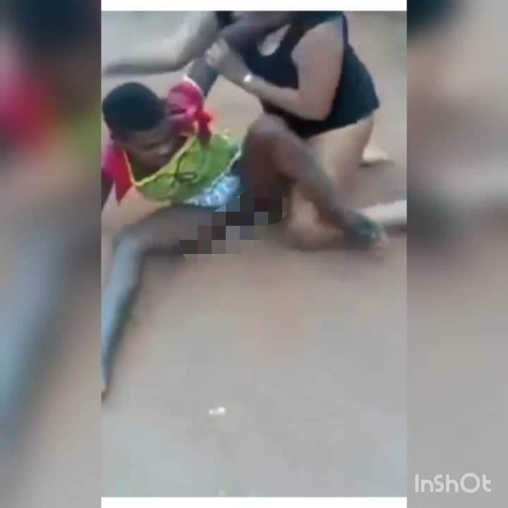 Why do some ladies fight in public? No Shame, no home training or what? Here is a viral but shameful video of two females – an big lady and a young girl, fighting in public to the extent of exposing their vital private parts to the onlookers. They fought, wrestled on the ground, exposing their panties and womanhood. The cause of the fight cannot be ascertained. But people, men, okada riders were there watching as unclothedness, nobody cared to separate them. What a shame!