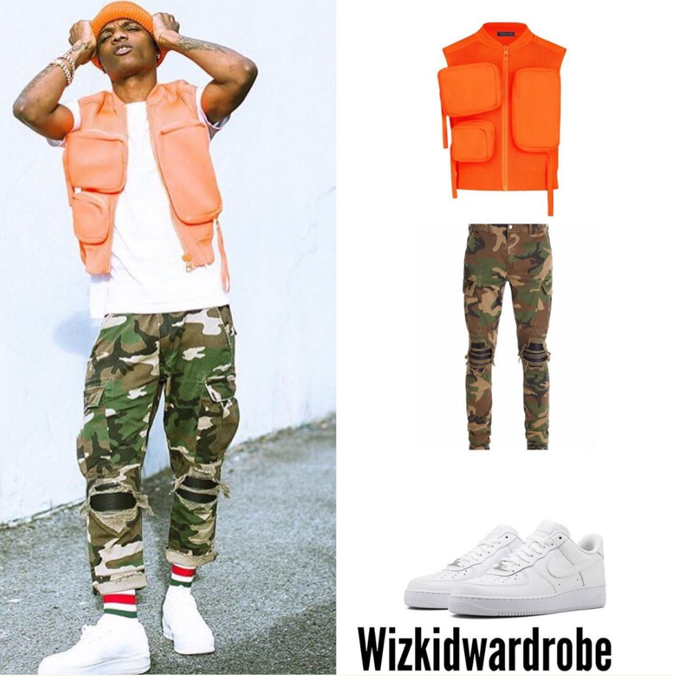 International Musician Wizkid shares adorable photos recently as he rock this expensive rubber Utility Gilet jacket worth 1million naira plus. Hereis the breakdown of his whole expensive outfit louisvuitton Rubber Utility Gilet $3,350 amiri MX1 Camouflage Print Cargo Trousers $1,250 nike Air Force 1 Low $90. Indeed wizkid is expensive.