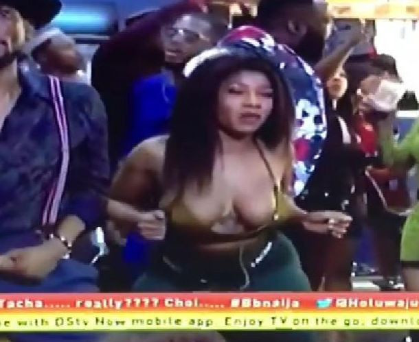 Big Brother Naija housemate,Tacha, left little to the imagination after she wore a tiny crop top that put her full boobs on display to the Saturday night party. Dj Xclusive was on hand to provide club banging tunes as the housemates had a swell time but Tacha stole the headlines with her ‘boobs’. See photos and reactions below….