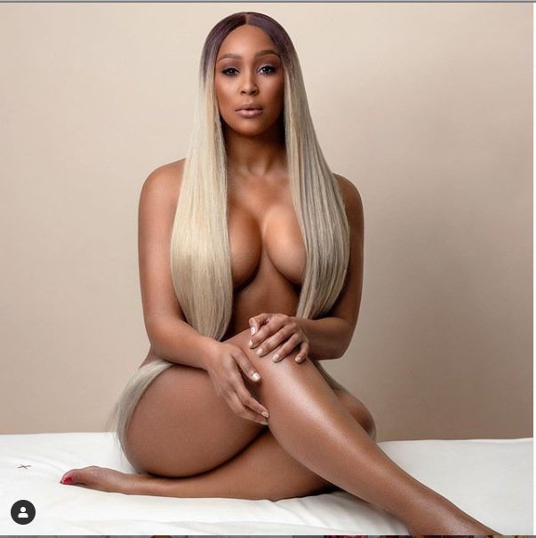 South African on-air personality and actress, Minnie Dlamini, 28, took to Instagram to share this raunchy photo of herself posing completely naked to celebrate her body. ‘Celebrate your skin’, she captioned the photo.