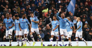 Sergio Agüero and Kyle Walker score late goals as Manchester City come from behind to beat Southampton 2-1 in the Premier League fixtures at Etihad Stadium on Saturday evening. James Ward-Prowse’s 13th-minute strike put the visitors ahead after Ederson howler, had been protected admirably by Saints for nearly an hour as City hogged the ball but could find no way through. But then Sergio Agüero’s volley from Walker’s cross gave the Argentinian’s 13th goal of the season and the latter’s closing-moments before former Tottenham right-back struck with four minutes of normal time remaining when Angelino’s cross was not cleared.Manchester City remain six points behind Premier League leaders Liverpool after fighting back to clinch a thrilling late victory over Southampton.