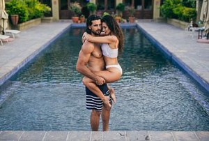 Beautiful South African model Alex McGregor posed for a photo shoot with a male model in some sexy settings. The couple are shown embracing each other in the garden While Alex’s shirt is completely wet and exposing her hard nipples. In other photos she is shown topless with her male counterpart hugging her from the back. But the best part is surely when he picks her up by the thighs in the pool to show off her plump ass.