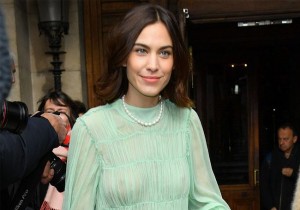 Alexa Chung puts on a see through top and she smiles for the paparazzi as they snap shots of her. She knows that she is going to make covers of several magazines since her nipples seem so prominent here. People will want to see them and that is the reason why she has that sexy smile on her face in all of these sexy shots.