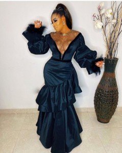 Actress Chika Ike steps out in glamor in this breath-taking outfit. She dazzles in the black magnificent with see-through effect and cleavage-baring effect to the premier of ‘living in bondage’.