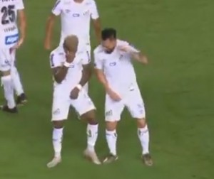 Santos midfielder, Marinho has introduced a VAR celebration after he scored an out of the box goal. As soon as the ball hit the back of the net and his teammates rushed to celebrate with him, he freed himself from their midst. He then made the hand gesture done by referees when they want a decision to be made via VAR.