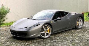 Burna Boy has capped an impressive year by spoiling himself with an expensive Ferrari 458 Italia car.   Nigerian singer and Grammy Award nominee, Burna Boy is living the dream life after acquiring a 2013 Ferrari 458 Italia.   The fast car which came in Matte Gray is like an early Christmas present the singer got for himself.   Photos of the new car has been shared on social media.   See more photos: