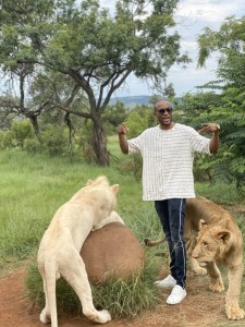 Reality star, Omashola Kola Oburoh has shown his brave side after he was spotted posing with lions.