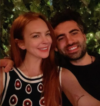 Lindsay Lohan Hints She’s Married As She Refers To Fiancé Bader Shammas As ‘Husband’