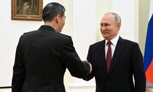 US-sanctioned Chinese defense minister meets Putin in Moscow, hails military ties