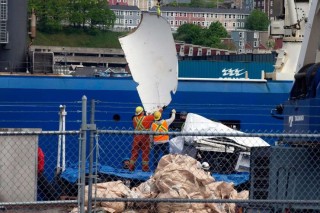 Human remains and debris from sub returned to land after fatal implosion near Titanic site