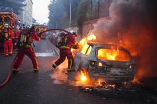 Unrest after police shooting of teenager prompts France to heighten security