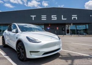 Tesla sees record global deliveries after lowering prices and tapping into EV tax credits