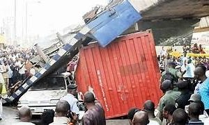 3 People Avert Death As a Container Smashes Into a Car in Lagos