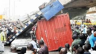 3 People Avert Death As a Container Smashes Into a Car in Lagos