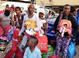 8 infants among the 155 stranded Nigerians return to their country.