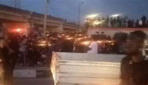 Candles are carried in a parade in Ekiti for the late singer Mohbad