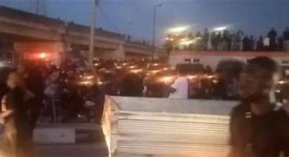 Candles are carried in a parade in Ekiti for the late singer Mohbad