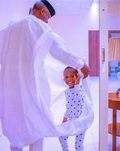 Osinbajo posts endearing images of himself with his grandchild.