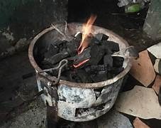 Residents of Enugu turn to charcoal and firewood as the cost of cooking gas rises.