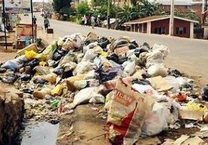 Pedestrians protest the careless disposal of trash on the Lagos-Ibadan highway