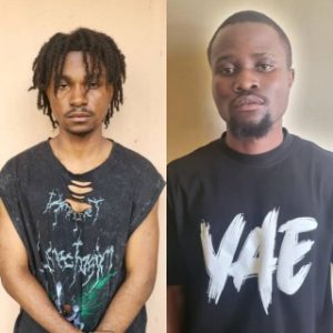 Two alleged internet fraudsters are detained by the EFCC at Skales' home on October 10, 2023.