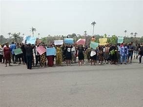 Women protest the murders and kidnapping of the king in Anambra