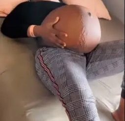 Nigerian Lady Shows Off Her Extremely Huge Baby Bump (video)