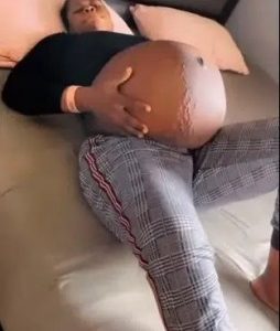 Nigerian Lady Shows Off Her Extremely Huge Baby Bump (video)