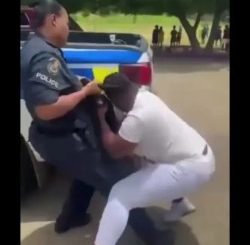 Police Woman Vs Mommy Fight At A School Gate In Jamaica (Viral Video, Photo)