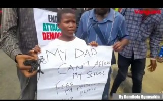 8-Year-Old Girl Joins Protesters In Ojota, Lagos (Photo)