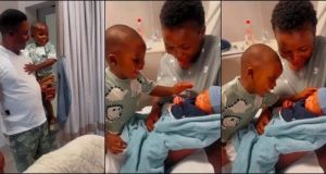 Adorable moment little boy meets his baby sibling for the first time