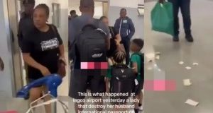 Lady tears husband’s international passport to pieces after they arrived at Lagos airport