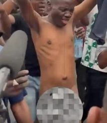 Man strips completely naked at protest ground (photos/video)