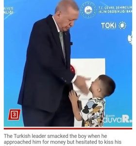 Outrage As Turkish President Slaps Child In Face For Not Kissing His Hand (Video)