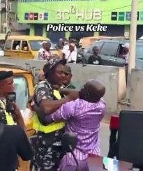 Police Officer And Keke Driver Strangle Each Other On Busy Road