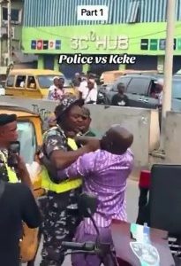 Police Officer And Keke Driver Strangle Each Other On Busy Road 