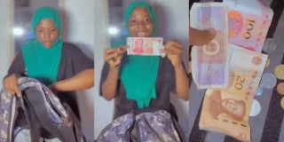 Thrift vendor jumps for joy as she finds money in bale of clothes