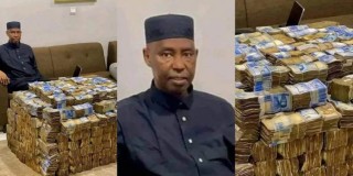 Nigerian Politician Goes Viral With Bundles Of Cash In Apartment