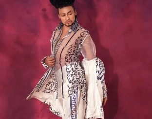 Denrele Edun reacts after questioned about his sexuality