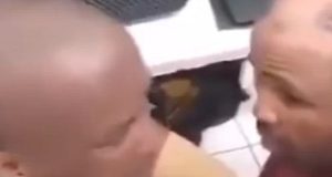 Two Men Forced To Kiss After Being Caught Stealing From A Shop (video)