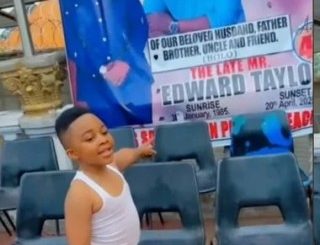 Moment boy confuses father’s obituary banner for birthday poster